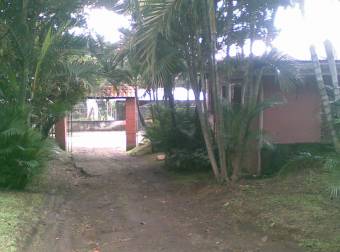  strategic lot with small house