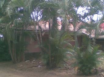  strategic lot with small house
