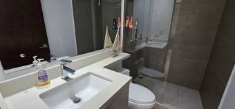 Se alquila apartamento amoblado en condominio de Pozos Santa Ana 25-941