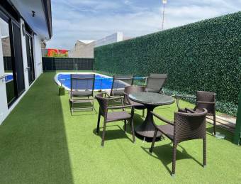 Casa moderna de un nivel con piscina interna y doble altura #26-713 GS