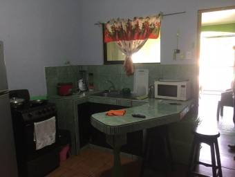 Bonita casa con Apartamento en el Centro de Guápiles en Venta.   CG-23-2529