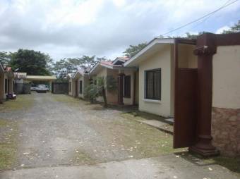 Fabuloso Urbanismo de 9 Casas todas Alquiladas en Guápiles en Venta.   CG-23-2534