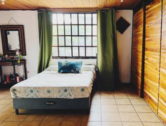 VENTA DE CASA CON AMPLIOS ESPACIOS EN SANTO DOMINGO DE HEREDIA.