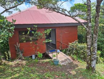 Venta de lote con cabaña