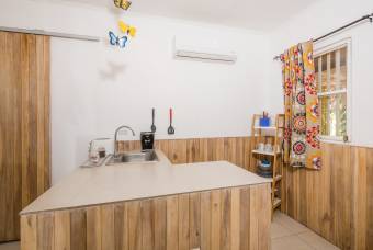 Propiedad Colonial con 7 Apartamentos, 2 Piscinas y Potencial Comercial en La Garita Nueva