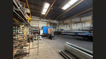 Terreno con Bodega Industrial en Heredia