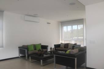 Se vende moderna casa con patio y terraza en condominio de Pozos en Santa Ana 24-406