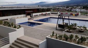 Se vende moderno y espacioso apartamento en torre de Merced en San José 24-622