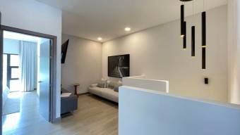 Se alquila moderna casa amoblada en condominio de Santa Ana 26-320