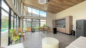 Se alquila moderna casa amoblada en condominio de Santa Ana 26-320