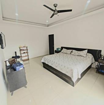 Se vende moderna casa con terraza en condominio de Guácima 25-488