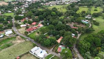 Flat land of 3,066 m2 with high density land use in La Guacima de Alajuela.