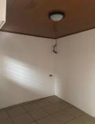 se vende casa con un apartamento y patio en Mercedes Heredia 22-2545