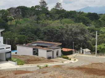 Se vende lote plano para construir en exclusivo condominio de la ceiba de Alajuela 23-2807