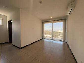 Se alquila espacioso apartamento en condominio de Pozos Santa Ana 26-290