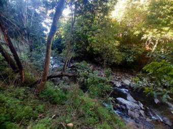 Se vende amplio lote de 3,400m2 en San Miguel de Heredia 25-129