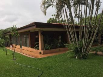 Se vende casa con lote de mas de 31200m2 en Guacarillo Poas A23-1977 