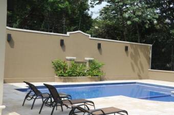 Hermosa casa en venta en prestigioso condominio en Pozos 22-1139