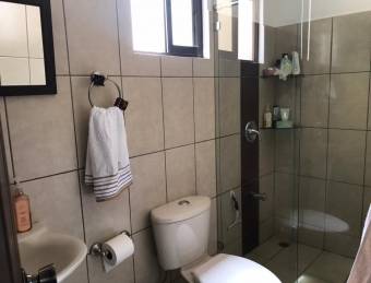 se vende bonita casa en condominio con piscina  en la Guacima 22-1395