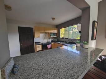 Se vende moderna casa en condominio de Pozos Santa Ana 24-1471 