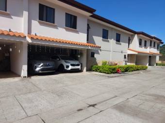 Se vende casa en condominio de Pozos Santa Ana 24-949